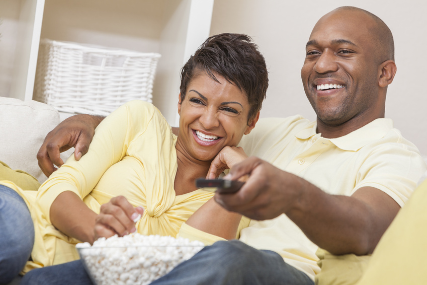 African American Couple Watching Television